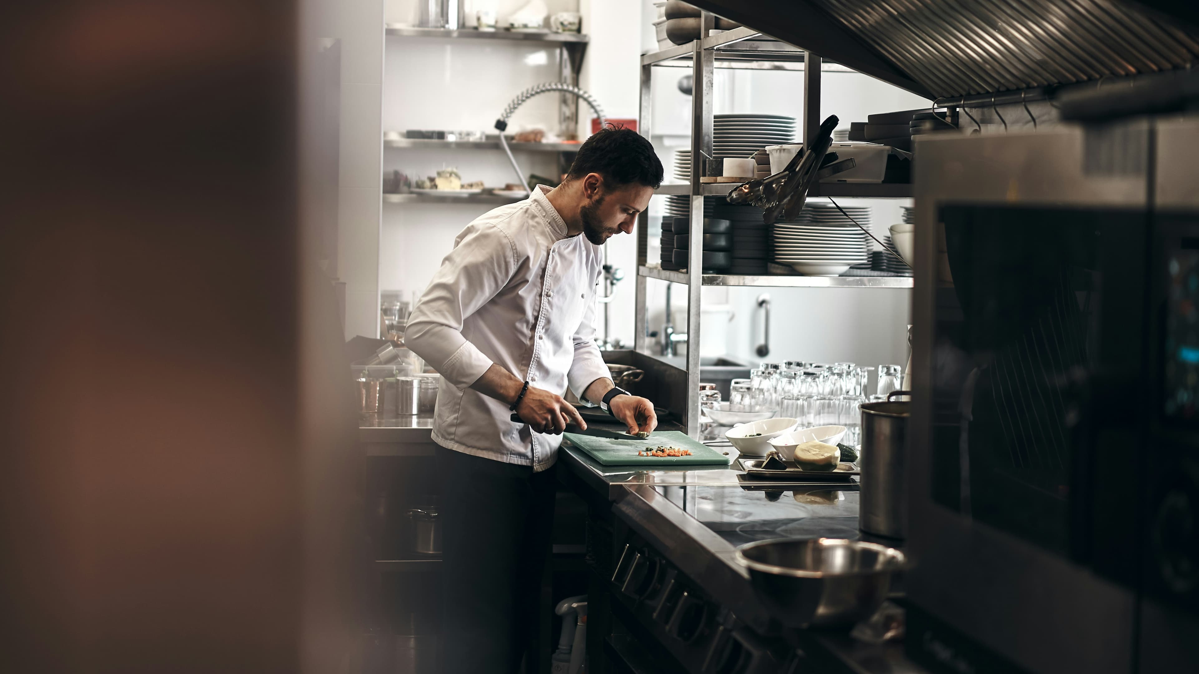 Chef preparing food in professional kitchen
